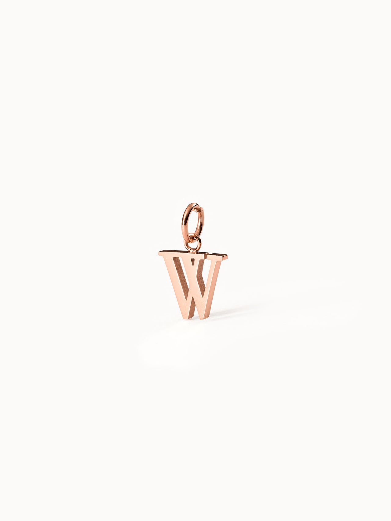 Roségoldener PURELEI Pure W Charm Anhänger aus Edelstahl, klar und elegant vor weißem Hintergrund.