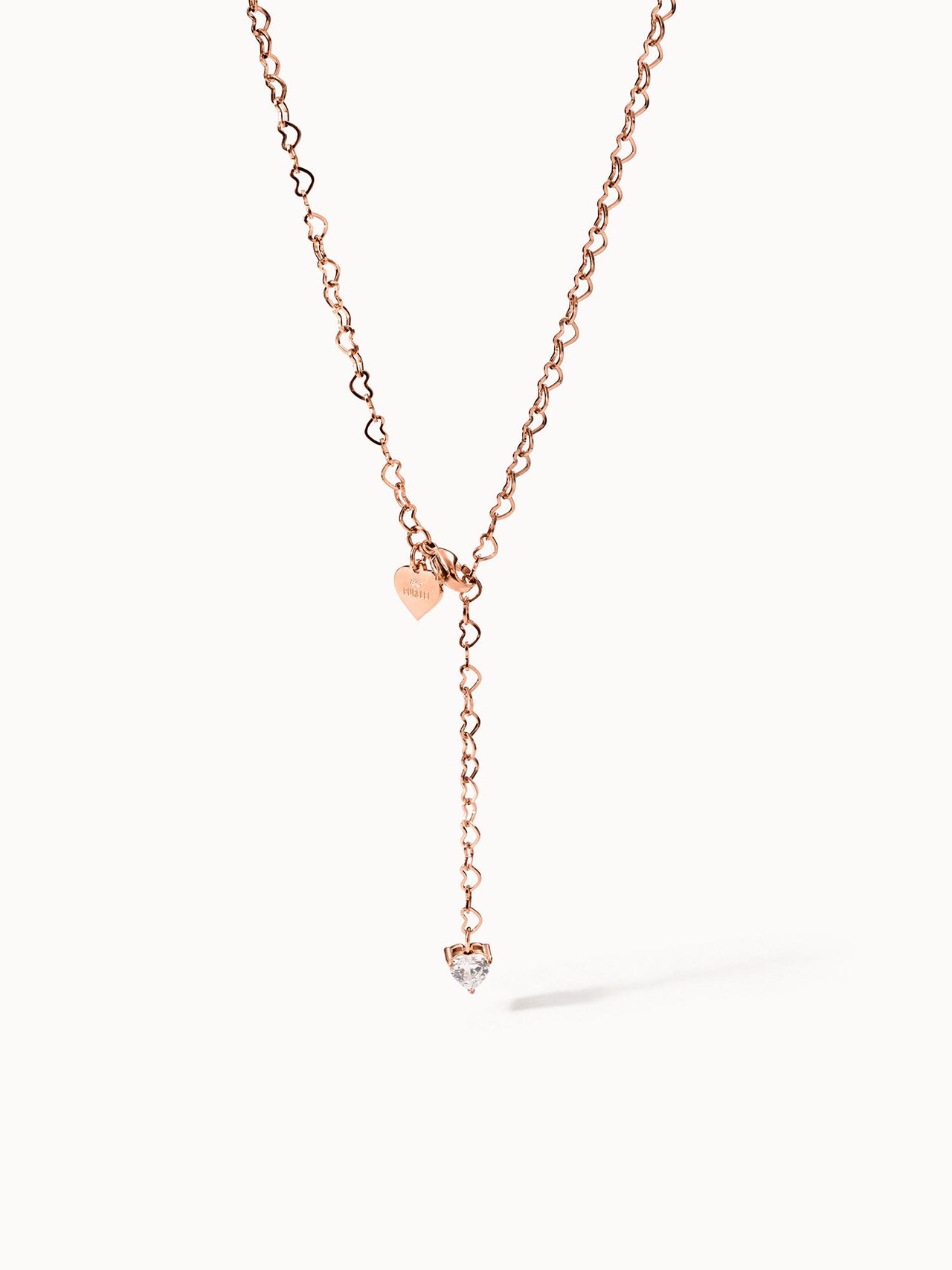Roségoldene Kette mit Herzanhängern und funkelndem Stein, PURELEI Eleganz.