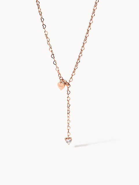 Roségoldene Kette mit Herzanhängern und funkelndem Stein, PURELEI Eleganz.
