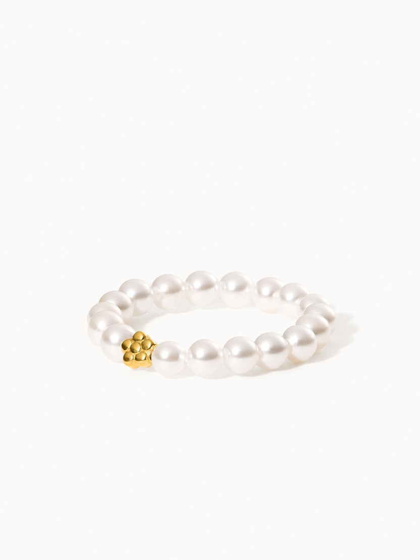 Anxiety Shiny Bloom Ring mit weißen Seashell-Perlen und goldener Blüte, elastisch, elegant, von PURELEI.