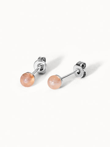 Silberne Ohrringe mit rosafarbenen Steinen, elegant und modern, von PURELEI.