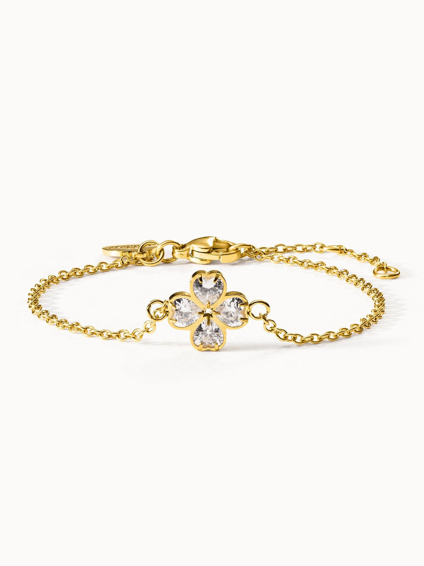 Goldenes Armband mit blütenförmigem Design und klaren Steinen von PURELEI.