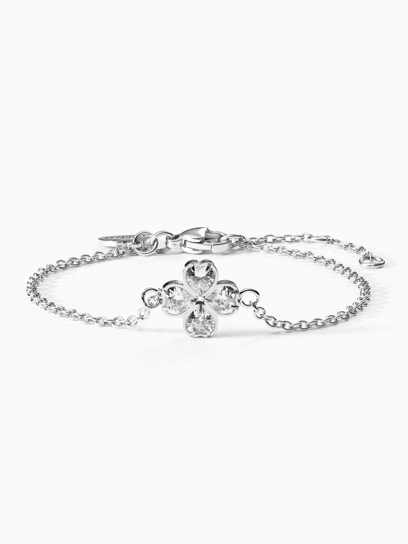 Silbernes Armband mit blütenförmigem Kristall-Design von PURELEI, elegant und funkelnd.