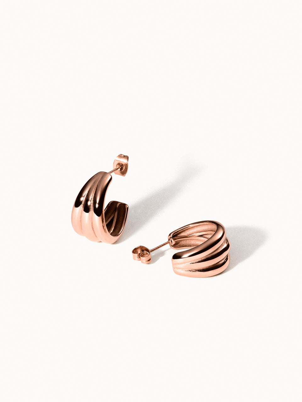 PURELEI Fused Ohrringe in Roségold mit verschmolzenem Design, elegant und modern, hochwertig, nickelfrei.
