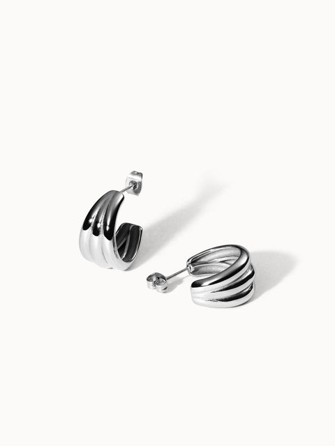 PURELEI Fused Ohrringe aus nickelfreiem Silber mit verschmolzenem Design auf weißem Hintergrund, elegant und modern.