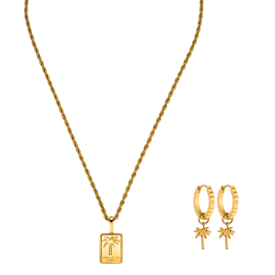 Goldene Kette mit Palmenanhänger und passenden Creolen von PURELEI, elegant und tropisch.