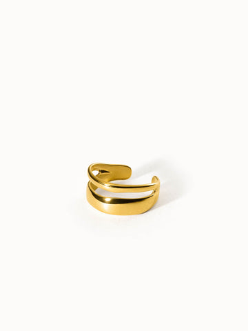 PURELEI Twin Tides Ring aus vergoldetem Edelstahl mit geschwungenen Bändern, elegant und feminin inszeniert.