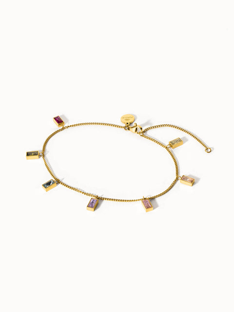 Rainbow Fusskettchen von PURELEI mit 18K vergoldetem Edelstahl und bunten Zirkonia-Steinen, elegant und lebensfroh.