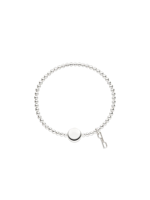 Silbernes Armband mit runden Perlen und glattem Anhänger von PURELEI, elegant und modern.