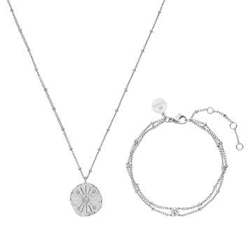 Silberne Kette mit Muschel-Anhänger und passendem Armband von PURELEI, elegant und modern.