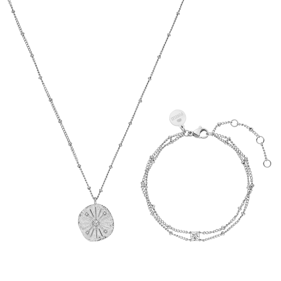 Silberne Kette mit Muschel-Anhänger und passendem Armband von PURELEI, elegant und modern.