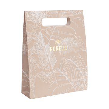 Beige Tragetasche mit floralem Design und PURELEI-Logo in Gold